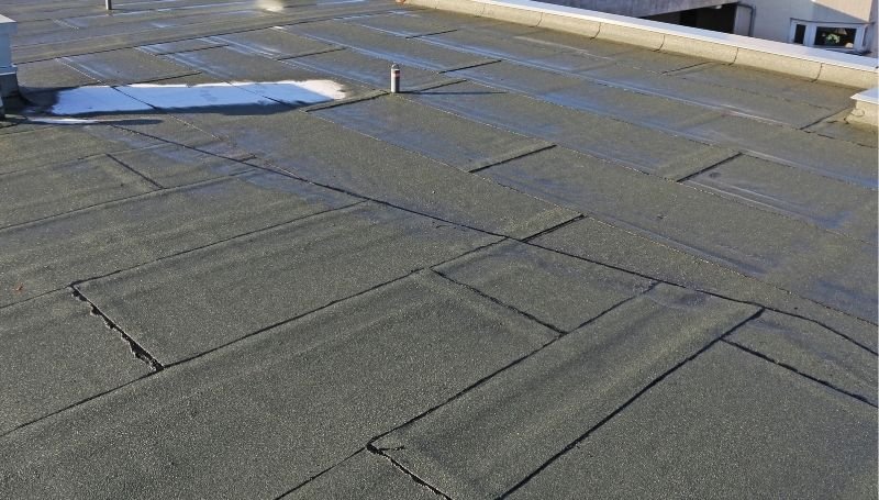 Building Regulations and Standards for Flat Roof Repairs